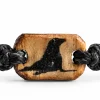 Close-up of the Cast Away Sea Lion wooden charm with a sea lion inlay