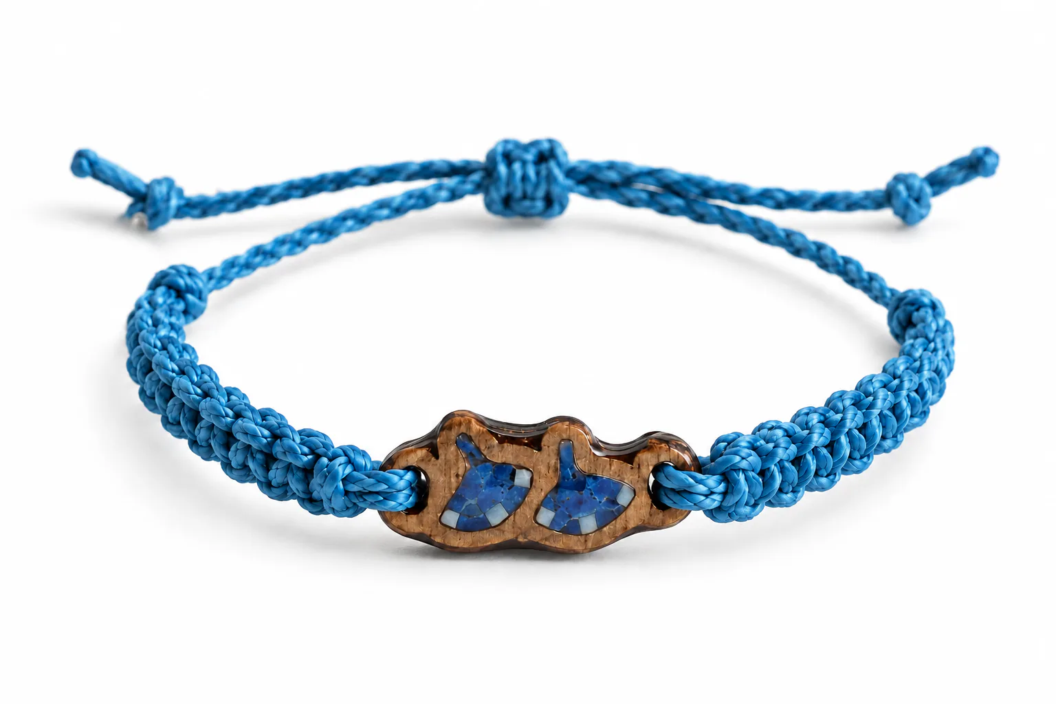 Cast Away bracelet in blue braided cord with a carved wooden charm