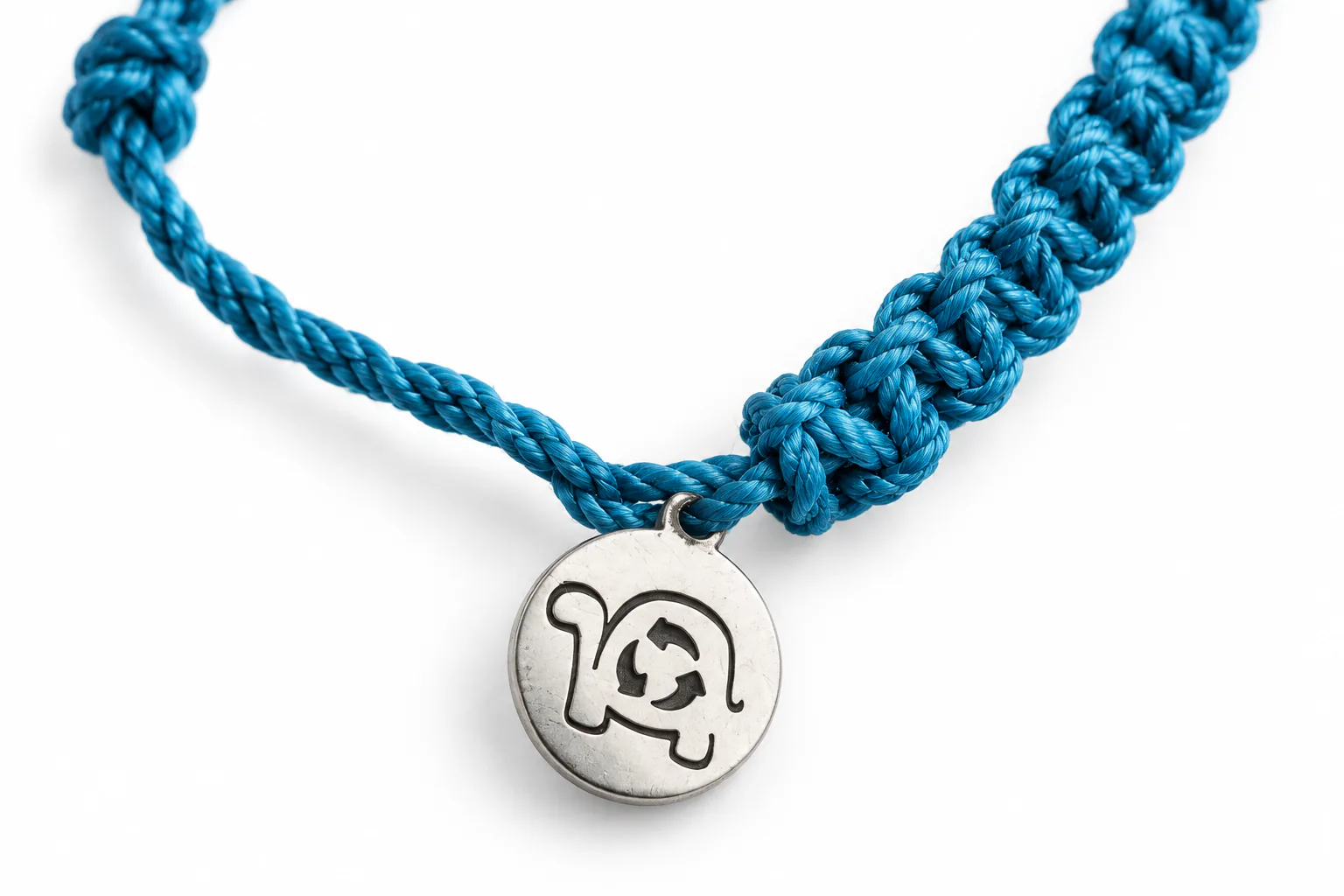 Blue Cast Away bracelet with its silver tortoise medallion