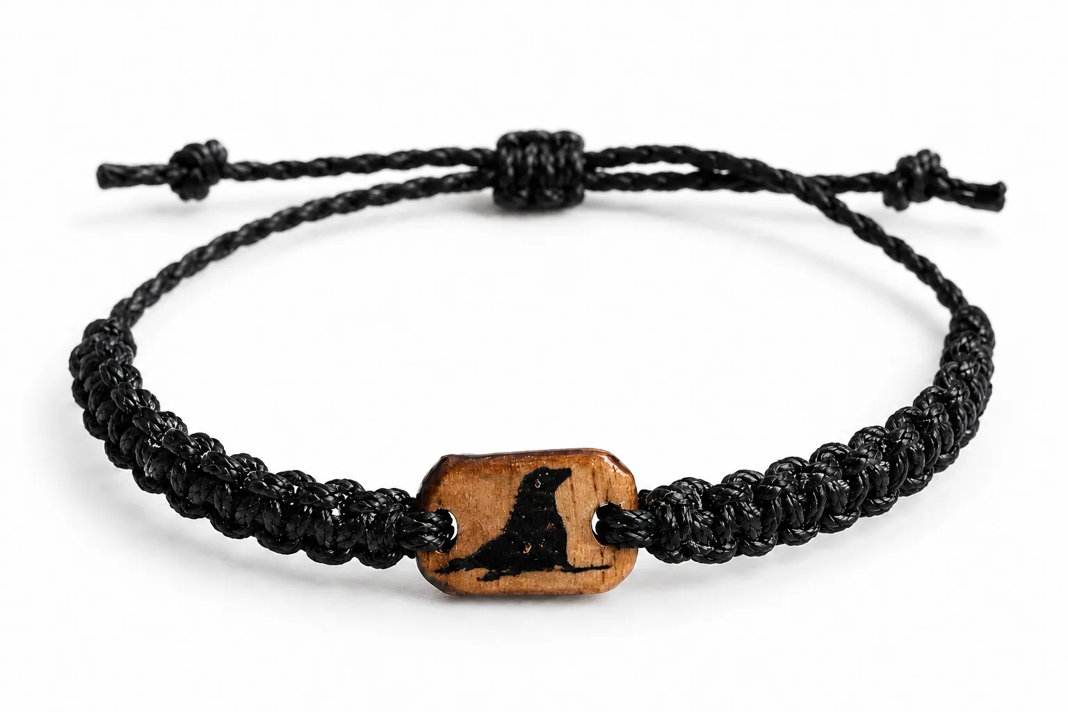 Cast Away Sea Lion bracelet in black braided cord with a wooden charm inlaid with a sea lion