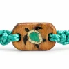 Close-up of the Cast Away Sea Turtle wooden charm with a green recycled plastic turtle inlay