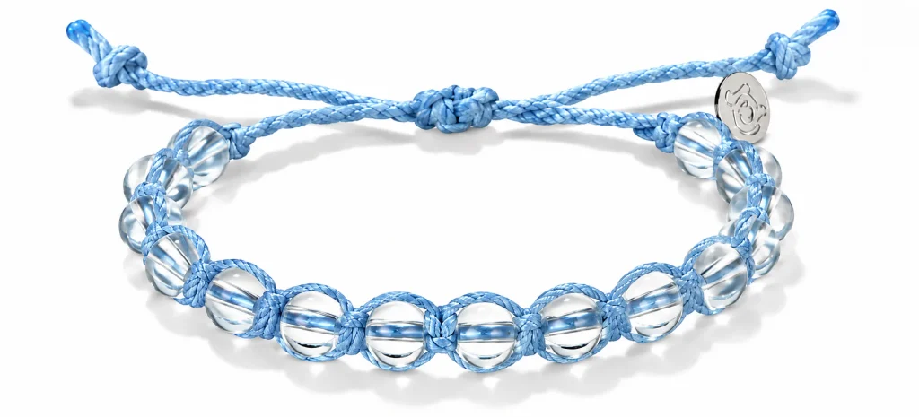 Galapagos bracelet in light blue recycled cord with clear beads and adjustable sliding knot