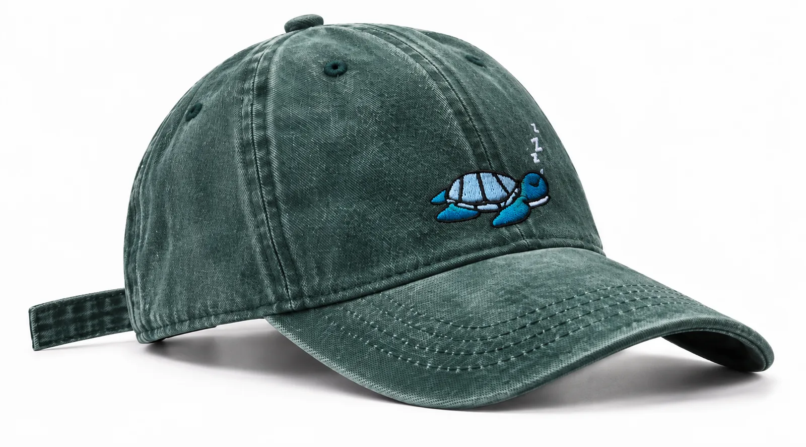 Forest green cap with a sleepy sea turtle embroidered on the front, side view