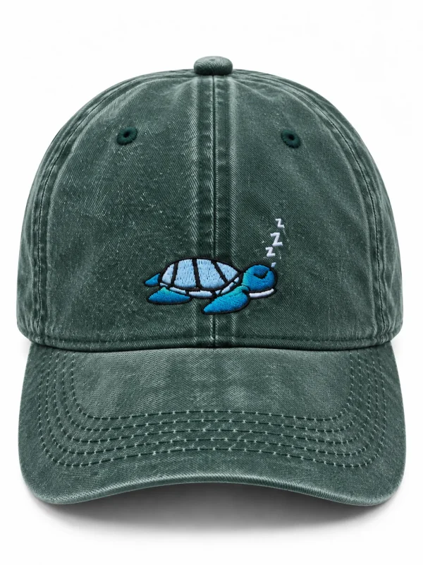 Forest green cap with a sleepy sea turtle embroidered on the front